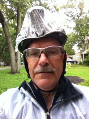 End of a damp ride.  Shower cap kept my head dry.